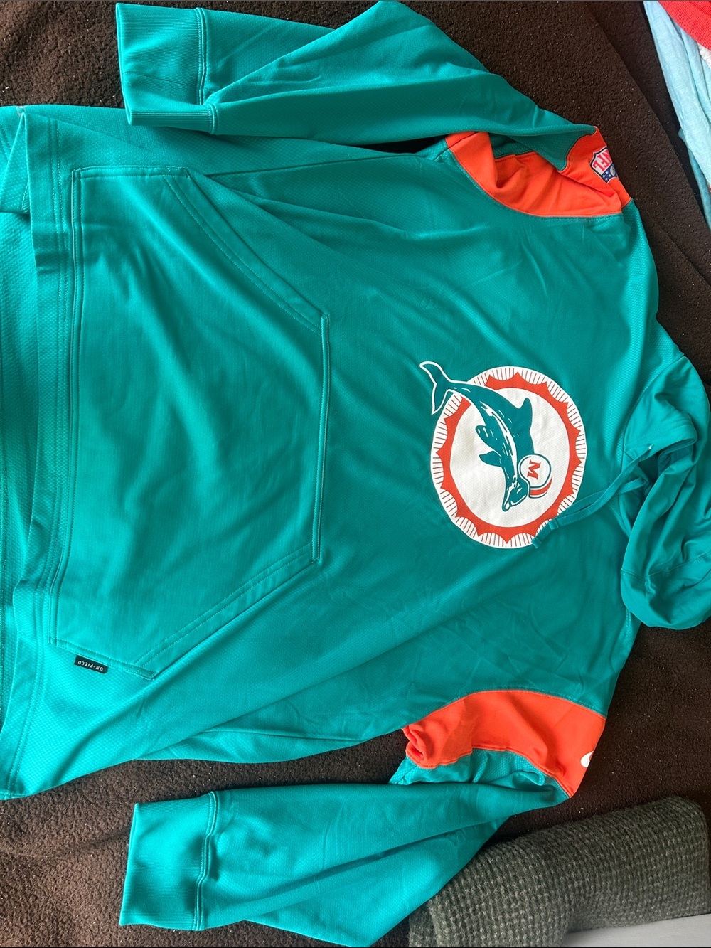 Nike Miami Dolphins Teal Pullover Hoodie with Orange Accents and Retro Logo